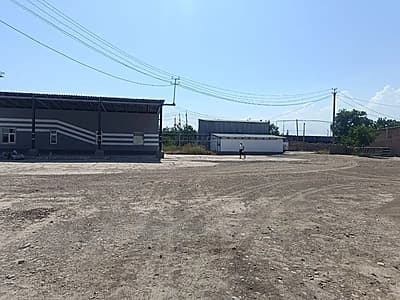 Прдается база в городе Ахангаран. Площадь территории 2,16 га. Есть ж/д ветка. — 9