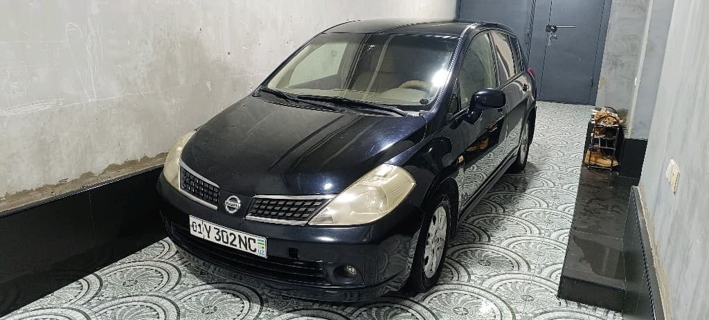 Nissan Tiida 2008 — 2