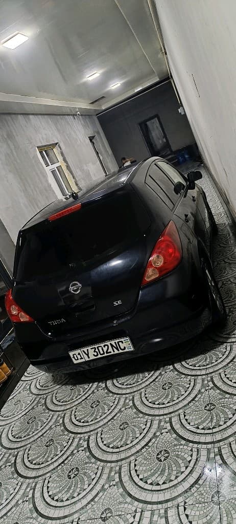 Nissan Tiida 2008 — 5