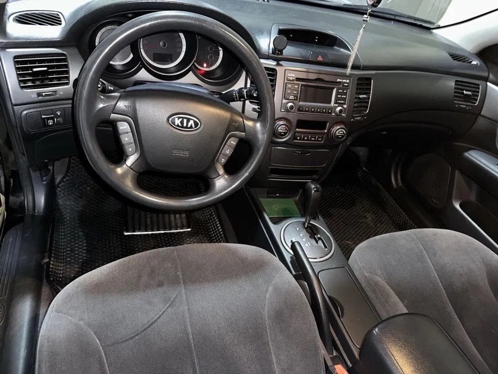 Kia Оптима 2009 — 7