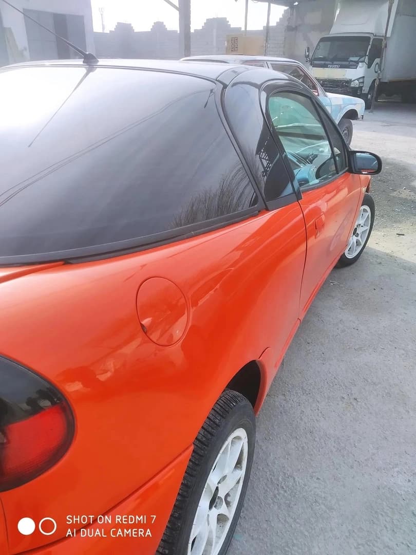 Opel Тигра 1997 — 3