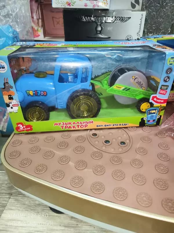 Музыкальная игрушка ”Синий трактор с прицепом катушкой” от Star toys — 1