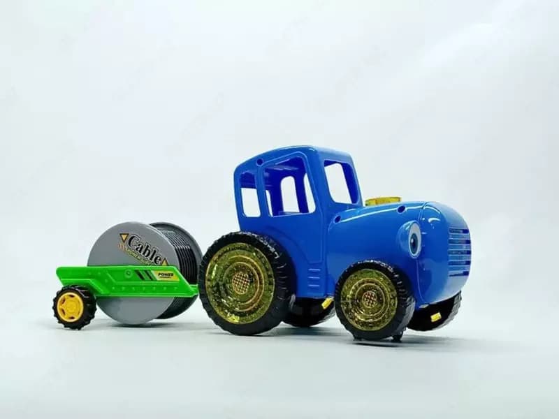 Музыкальная игрушка ”Синий трактор с прицепом катушкой” от Star toys — 2