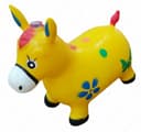 Резиновая игрушка ослик желтого цвета с цветными рисунками.