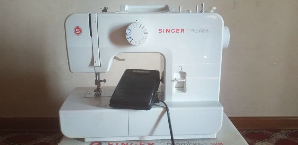 "Singer" 100%kafolat.Holati yangi ,3-4marta tikilgan, — 1