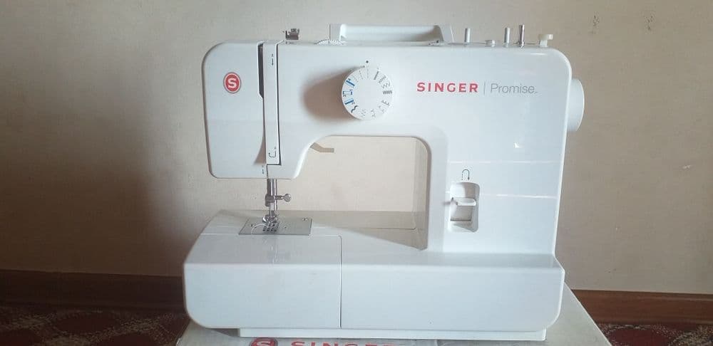 "Singer" 100%kafolat.Holati yangi ,3-4marta tikilgan, — 2