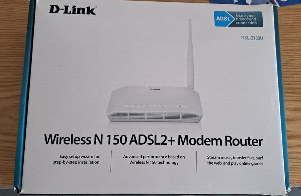 Модем D-Link DSL 2730U модем роутер — 1