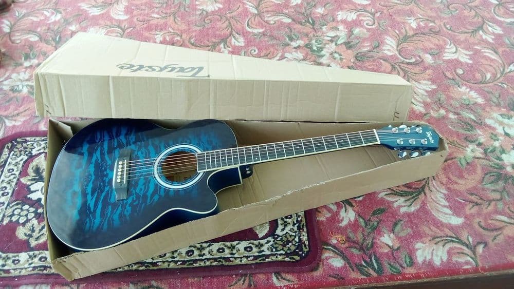 gitara yangi hali 2 oy bomadi ishlatilmagan — 1