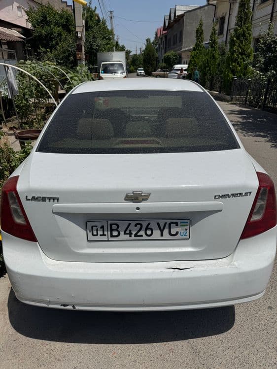 Lacetti 1.8 MT 2011 — 4
