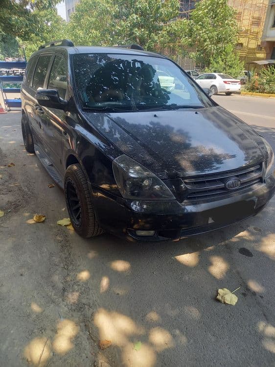 Kia Grand Carnival Long ( Turbo disel 2.9 CRDI ) — 2