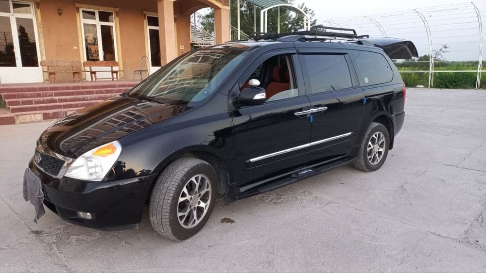 Kia carnival. 2011-yil. 4ta yangi balon. — 1