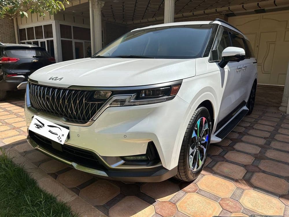 Kia Carnival 4 белый — 4