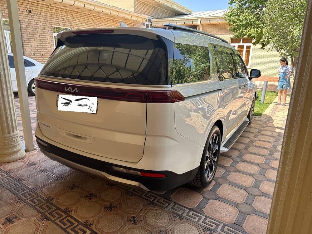 Kia Carnival 4 белый — 8