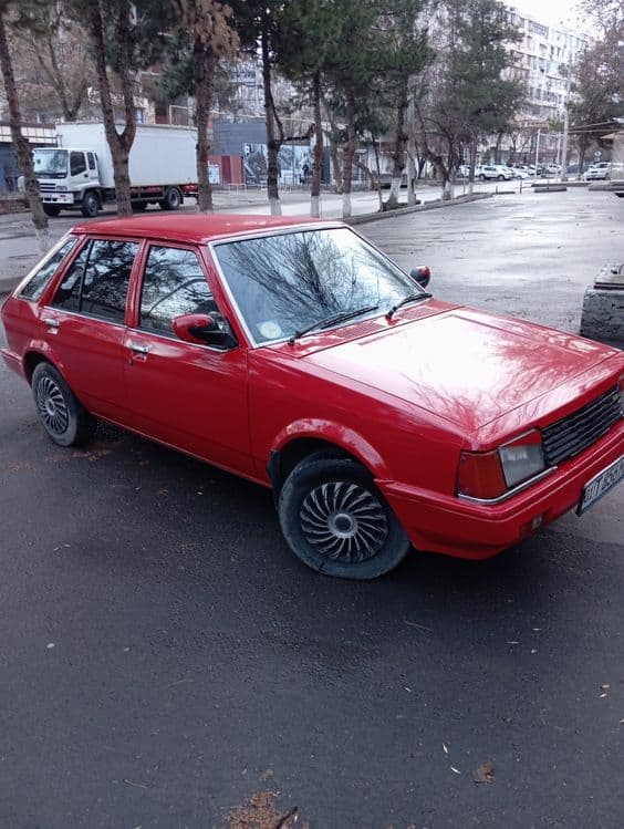Мазда 323 фамилия — 5