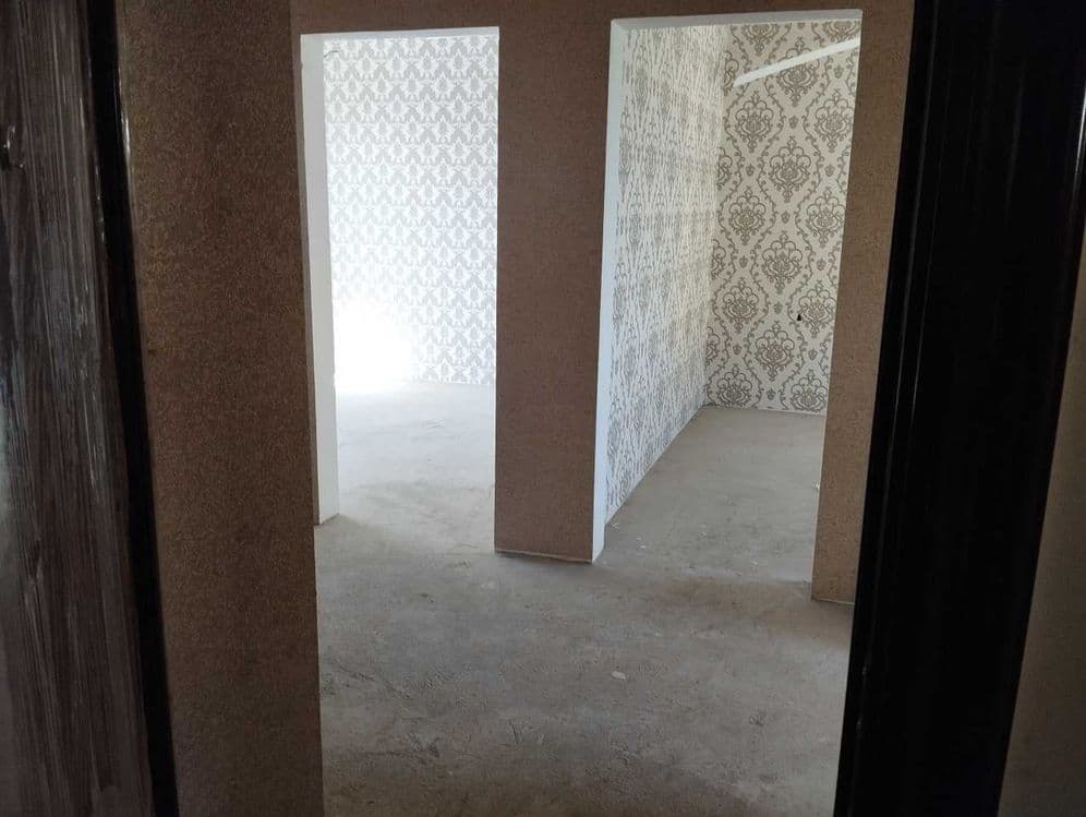 Ko`p qavatli uydagi xonadon — 2