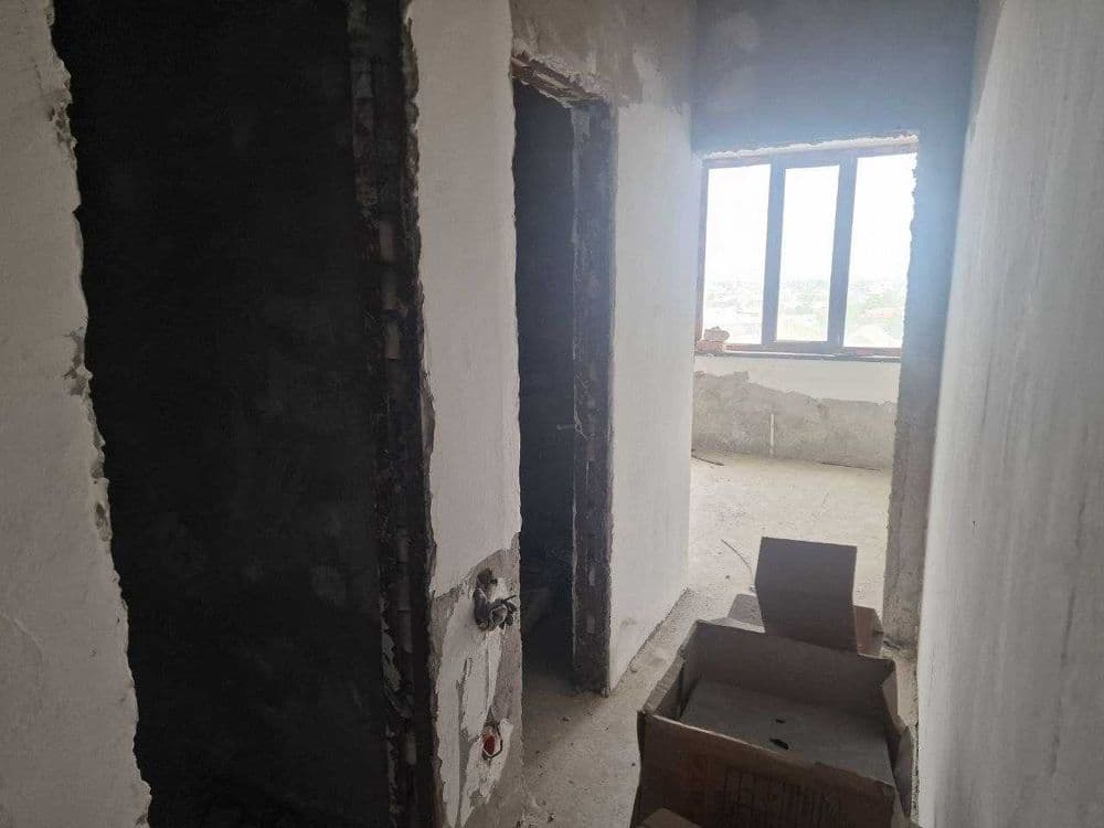Ko'p qavatli uydagi xonadon — 2