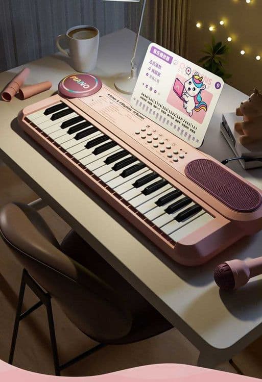 Детское игрушечное пианино 37 клавиш с микрофоном розовое — 1