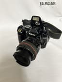 Nikon D3000 фотоаппарат