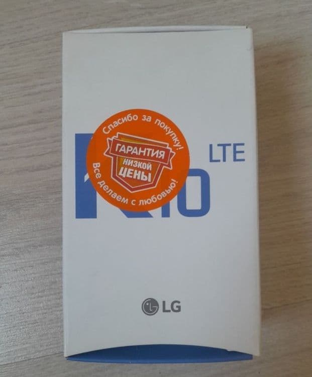 Телефон LG K10, LTE, черного цвета, с золотистой крышкой корпуса. — 7
