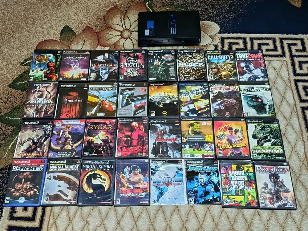 Продам playstation 2 вместе с дисками — 1