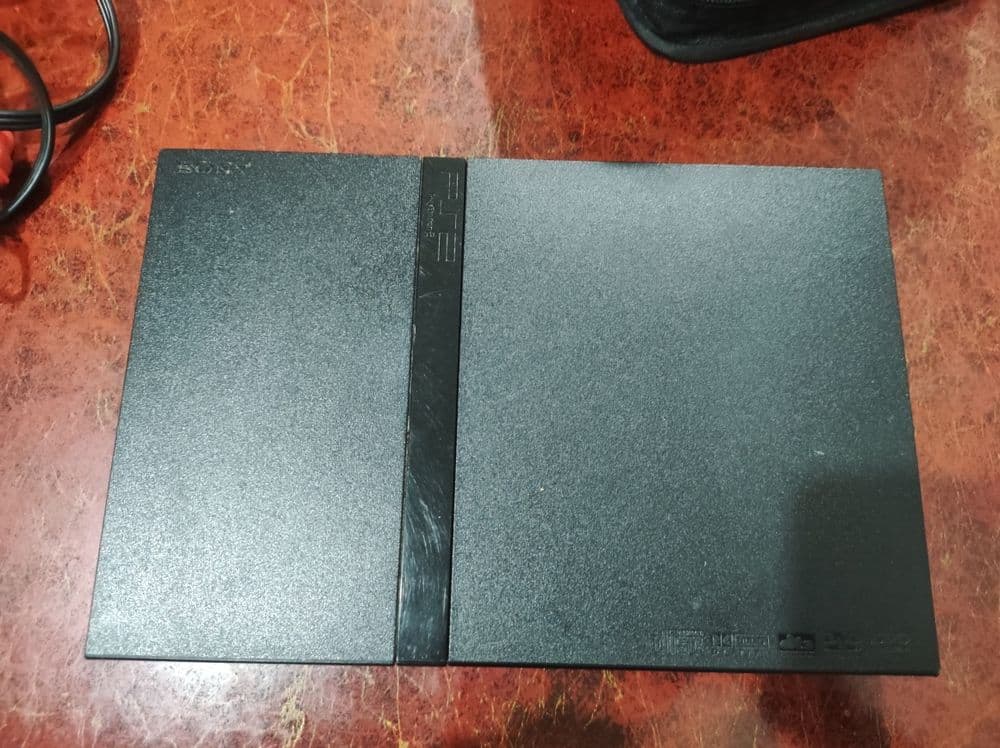 Продаю плейстейшн Sony 2 с дисками игр и джойстиками. — 2
