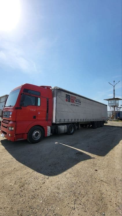 Man TGA +schmitz — 2