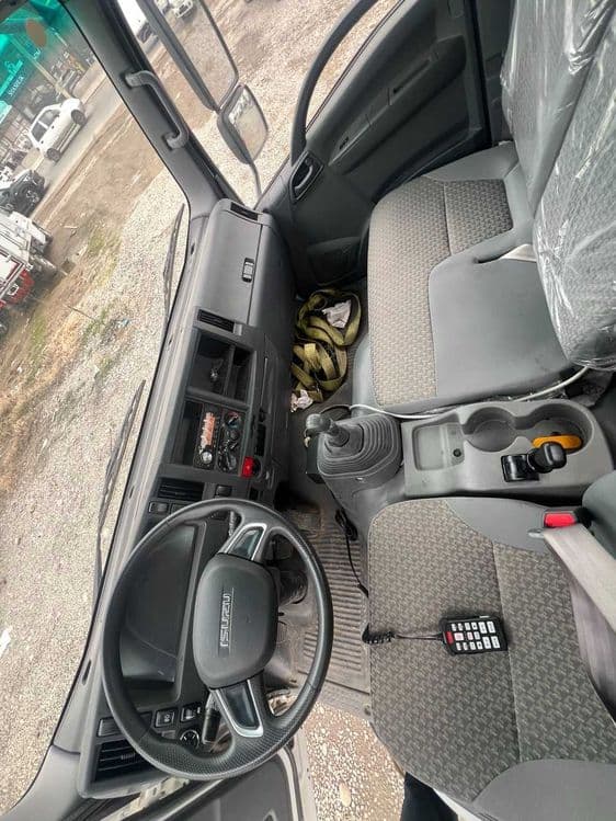 ISUZU ELF KV100 Эвакуатор — 5