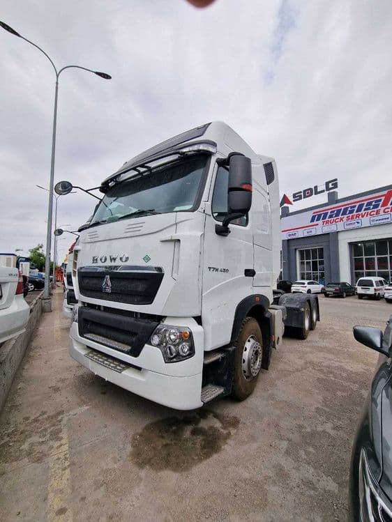 Седельный тягач Sinotruk Howo-T7H 6x4 CNG в НАЛИЧИИ — 1