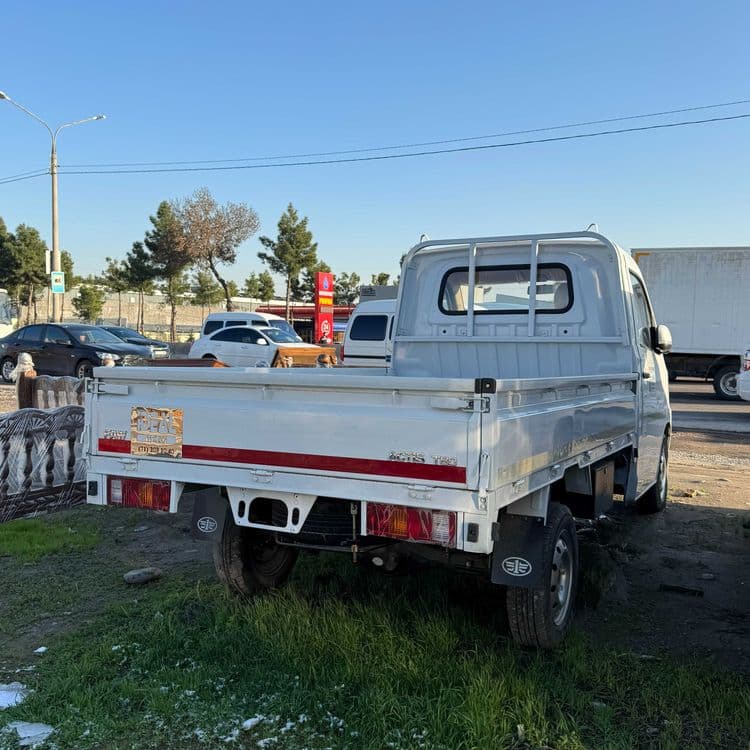 Bortavoy Tentovka Zavodskoy Metan Gaz Sotiladi FAW Mini yuk mashinasi.