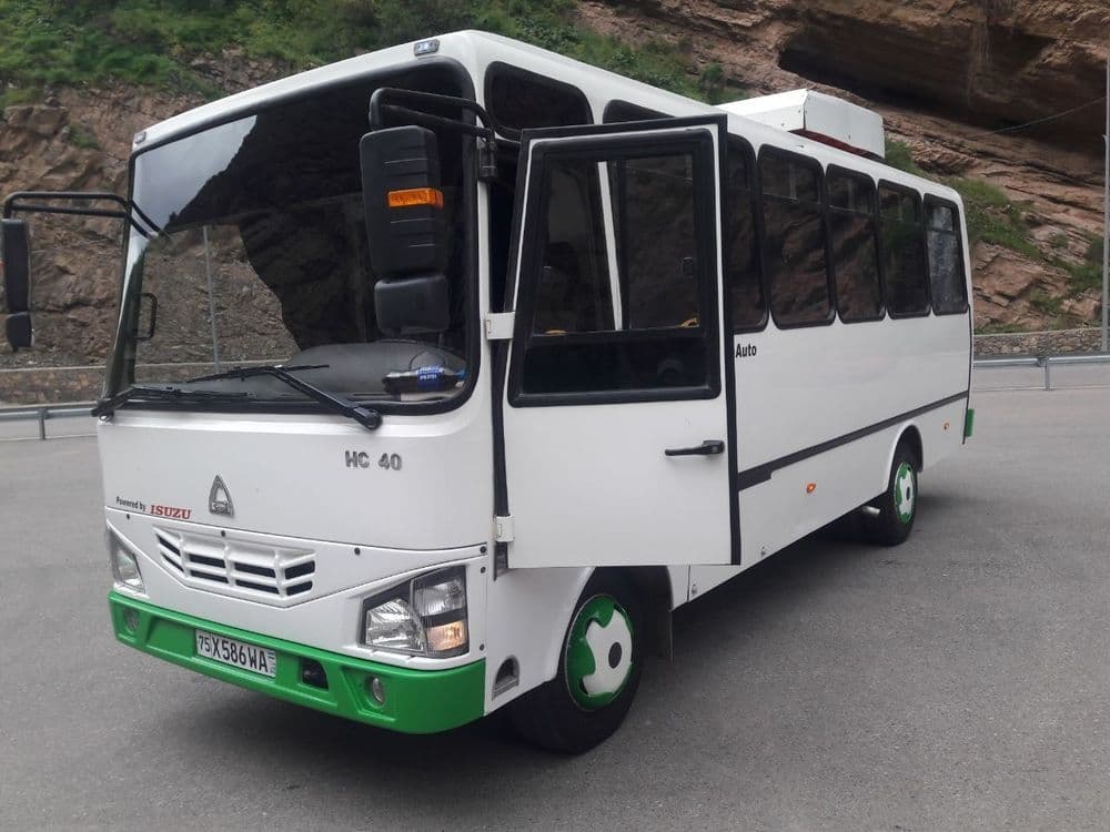 Isuzu avtobus.            . — 6
