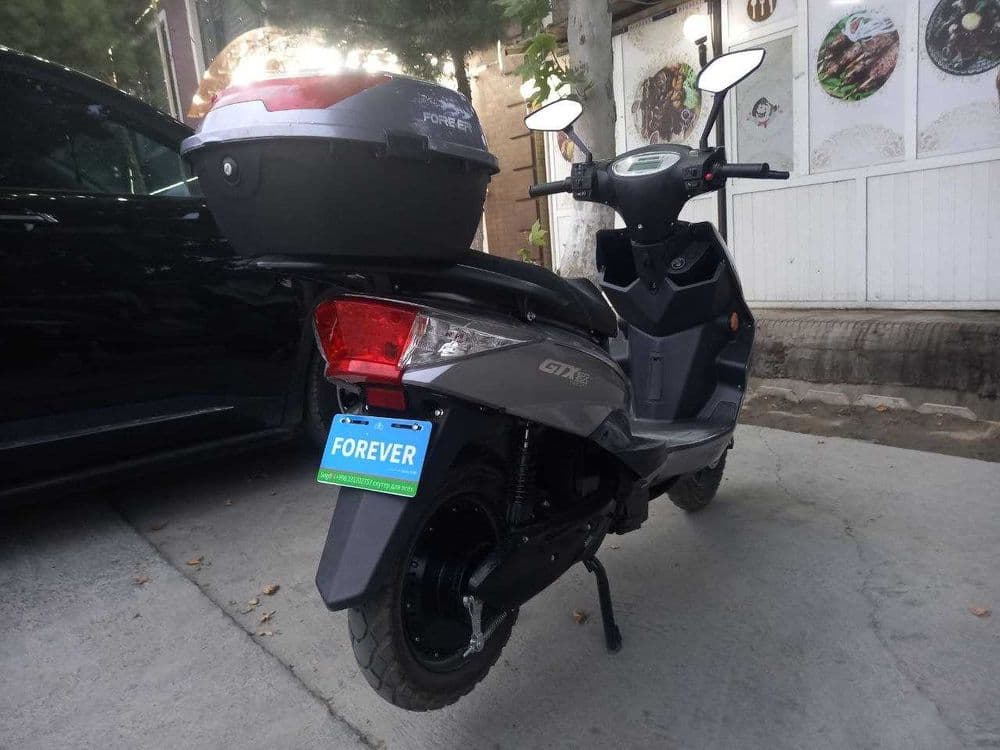 Sukuter yangi eliktroni katta sukuter — 2