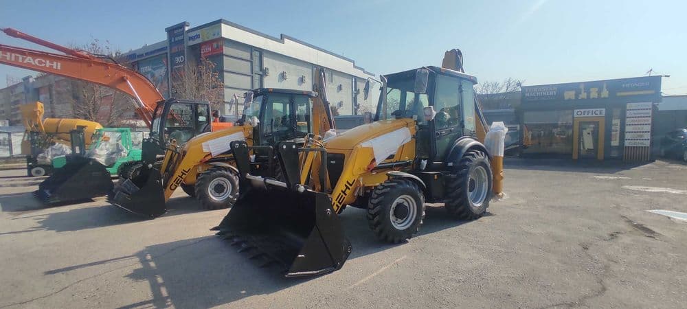 Экскаватор погрузчик Gehl GBL X-920 — 1
