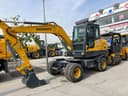 G’ildirakli ekskavator/ Колесный екскаватор