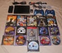продам SONY PLAYSTATION 2 super slim прошитый+15шт с играми срочно